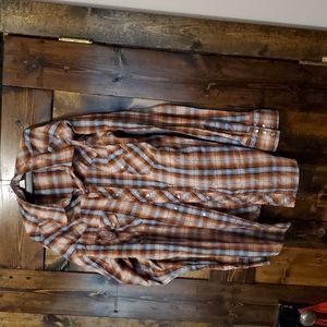 Orange pearl snapped western shirt